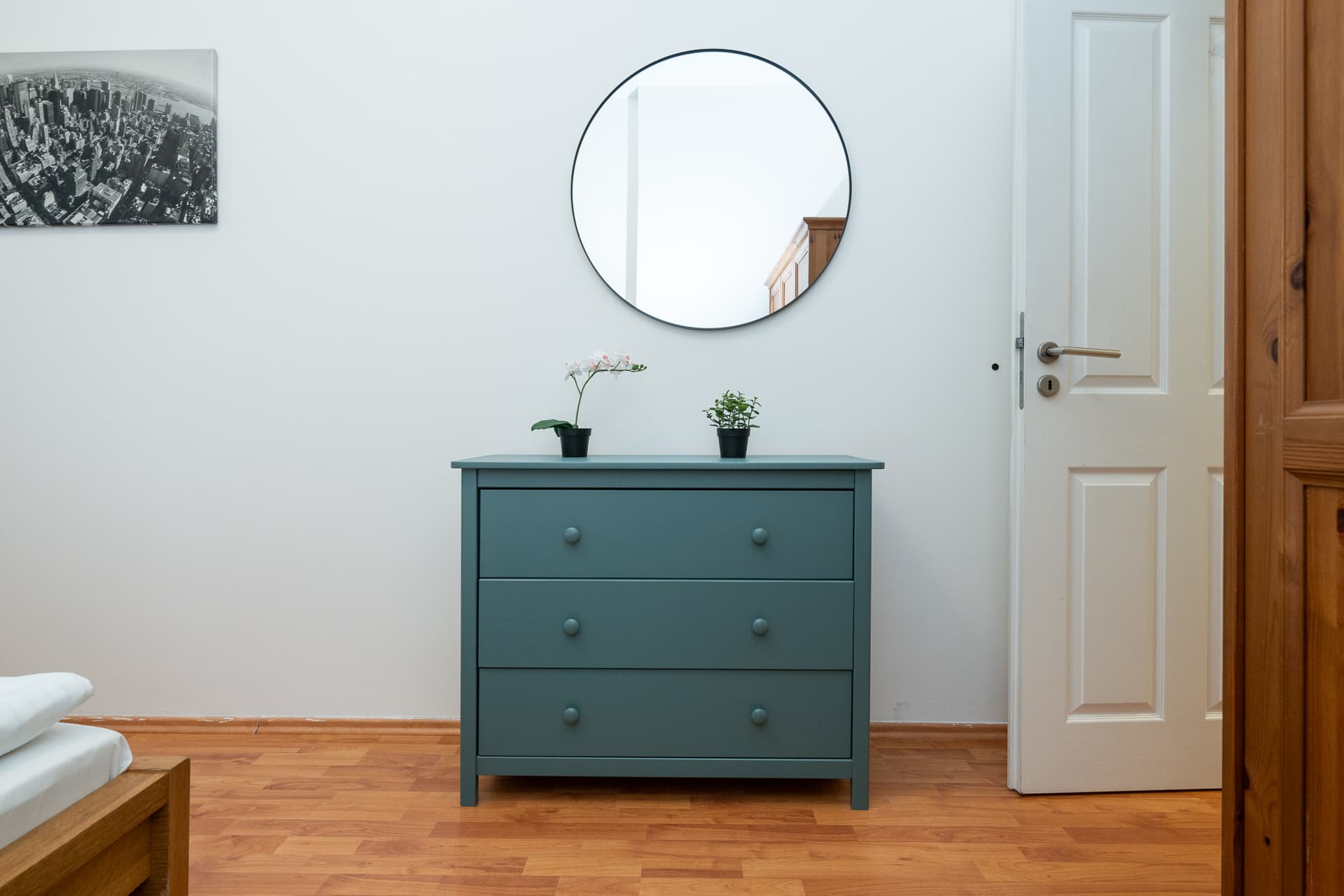 Letna71 bedroom dresser, mirror and warm wood floor