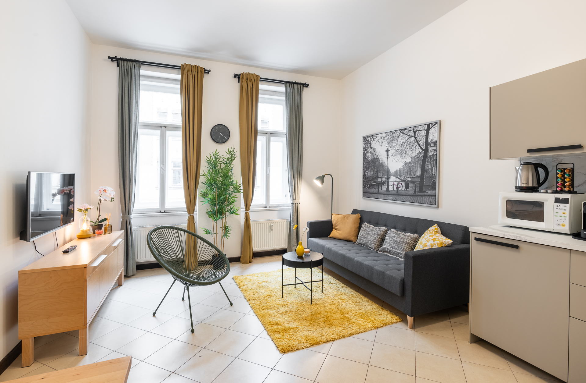 Warm modern apartment living room with natural light